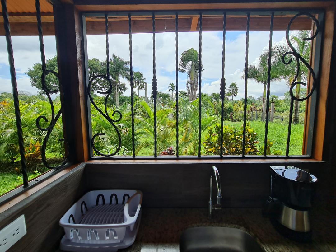 Cabin Eco Container Panoramic window view from inside the eco-container cabin, La Fortuna.