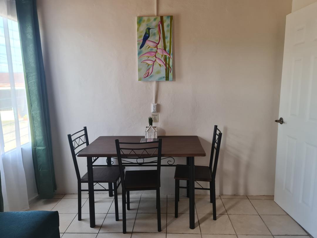 Dining room with rustic style in Guayabón Cabin 4